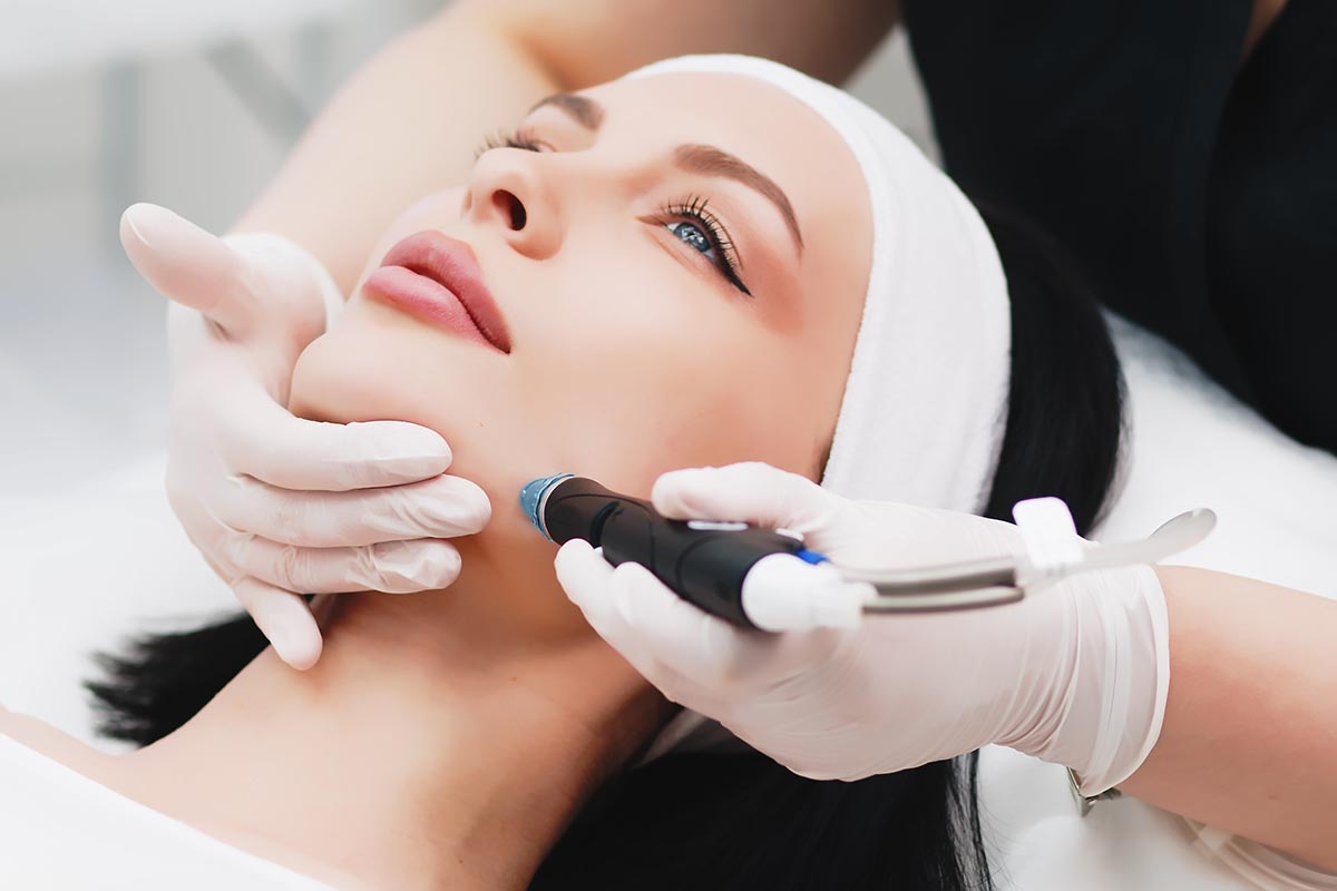 Woman receiving Hydro Facial in Bartlett, IL for deep cleansing and skin rejuvenation