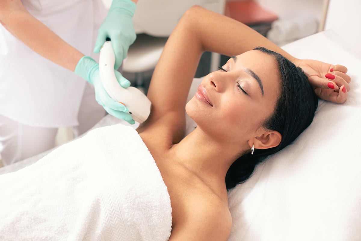 Patient receiving Laser Hair Reduction in Bartlett, IL on underarm area